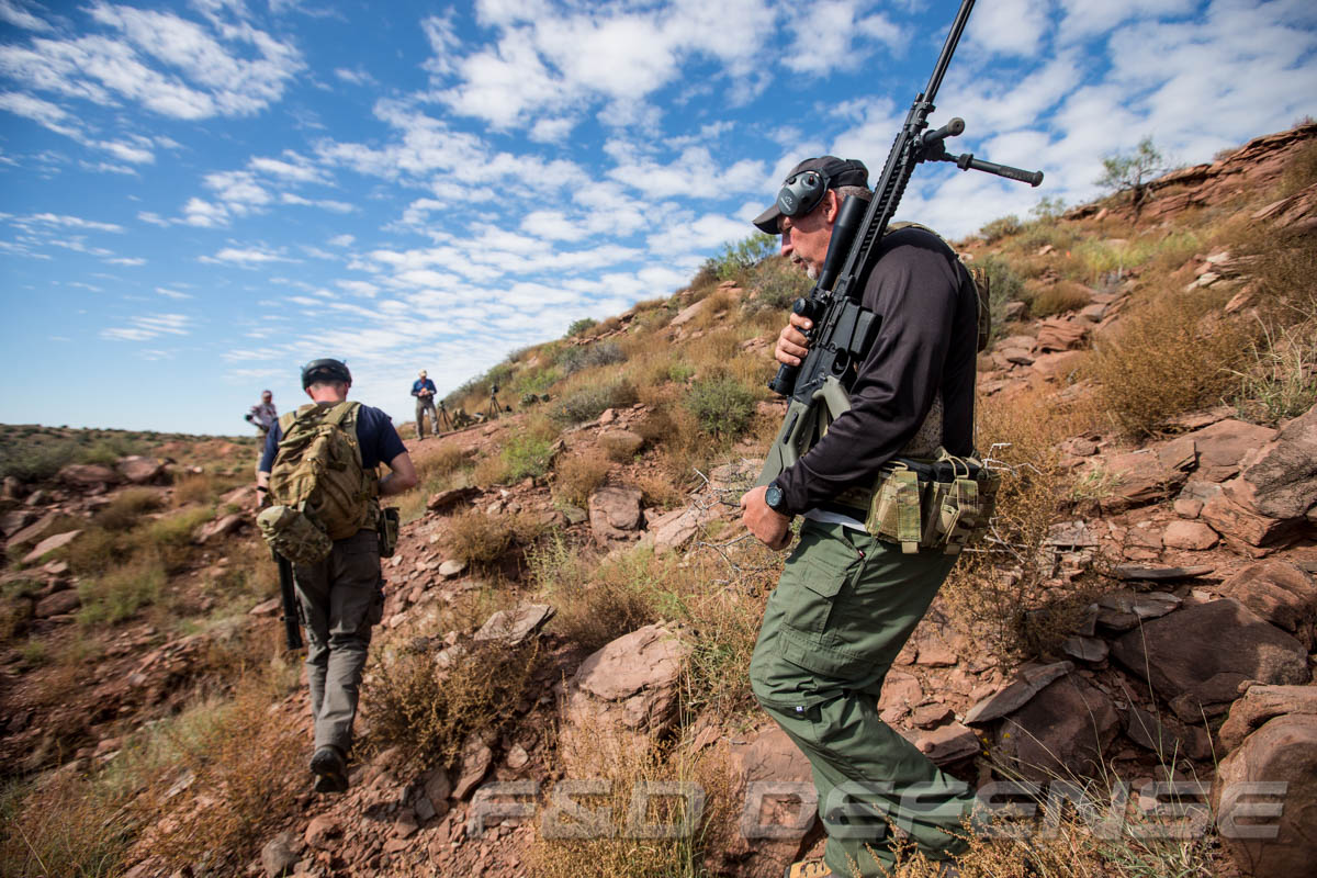 The F&D competition team moves between shooting stations during the Competition Dynamics 2015 Team Safari at Blue Steel Ranch in Logan, New Mexico.